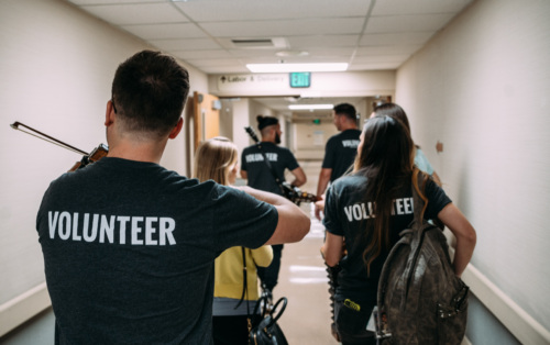 MOC Volunteers wearing shirts that say 