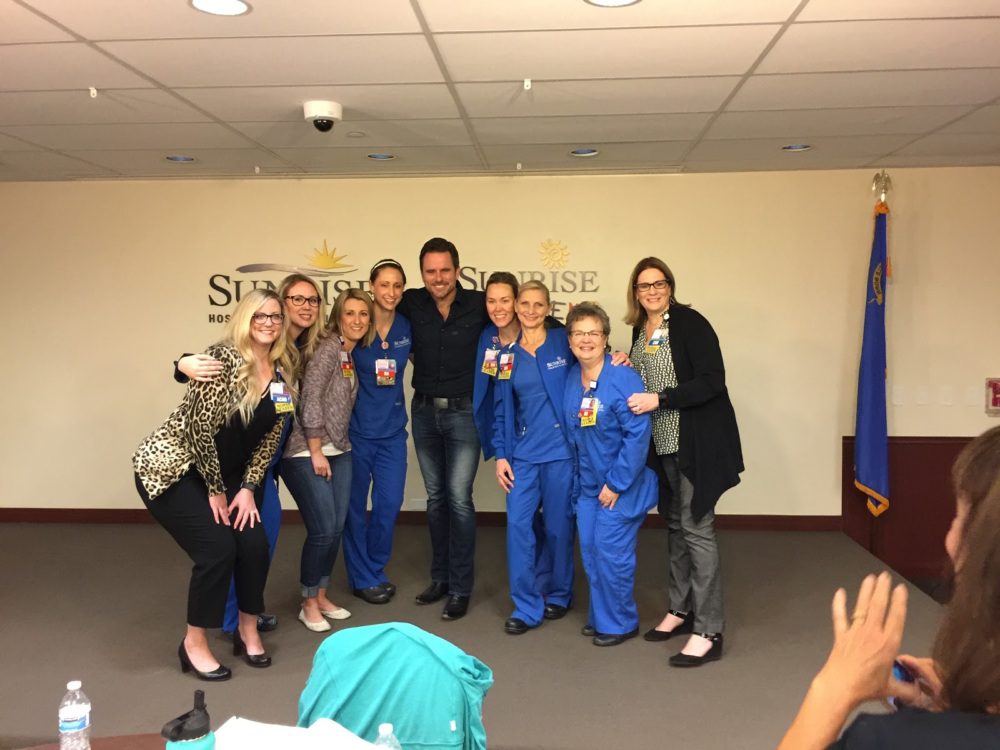 Charles Esten poses with caregivers and hospital workers at Sunrise Hospital in Las Vegas, days after the Route 91 Shooting