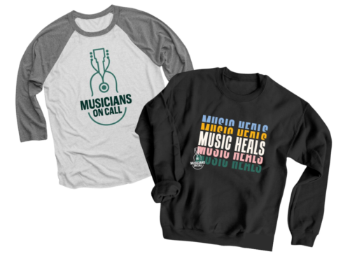 A grey baseball tee with Musicians On Call's logo, as well as a dark grey crewneck with the phrase 