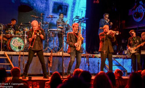 The horn section of Chicago playing enthusiastically at the Hard Rock Cafe in support of Musicians On Call