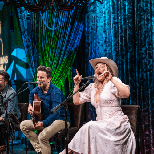 Lauren Alaina engages crowd beside Charles Esten and Matthew Ramsey