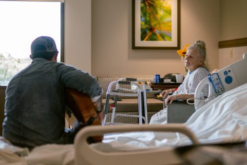 Photo of Michael Ray with a patient