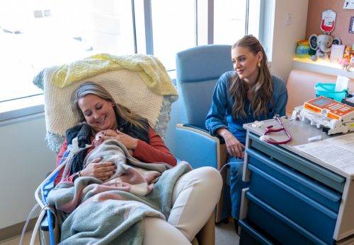 Kelsea Ballerini singing to a hospital patient